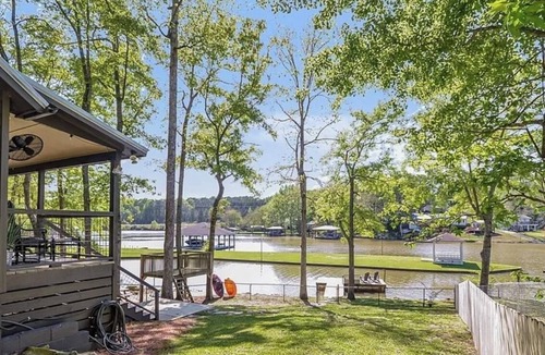 Alexander City House | Lake Martin Waterfront-quiet cove, boat ramp, dock and fenced dog friendly yard