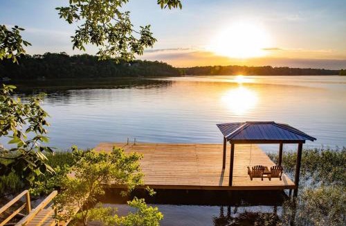 Northport House | Lake T Retreat - Sunset - Pool - Putting Green