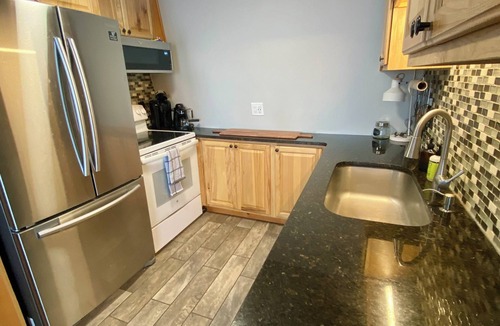 Lake City House | Lakefront 5BR/3BA. Dock, Kayaks, Hot Tub & Games!
