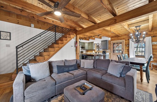 Milledgeville Cabin | Lakefront Escape w/Private Water Access, Dock, Kayaks, & Fire Pit. Pet Friendly!