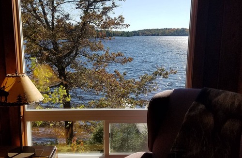 Eagle River House | Lakefront Large Lodge in quiet bay~ Pontoon Rental Available