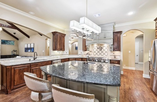 Wylie House | Lakefront Mansion with Pool and Cinema