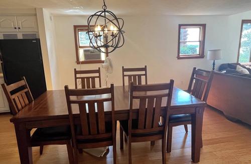 Newaygo Cottage | Lakefront Retreat near Dragon Trail! Big Dock, Patio, Views & More!