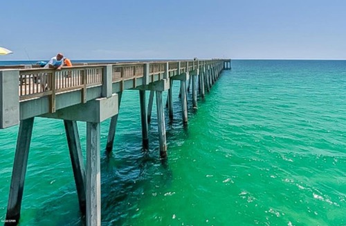 El Centro Beach House | Lakefront townhome near great attractions with beach access pool & amazing view