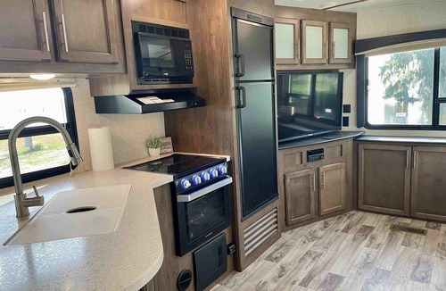 Lake George House | Lakeside 27' Cougar Travel Trailer on Lake George