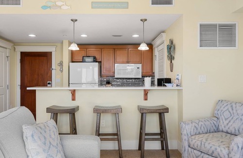 Baytowne Wharf Condo | Lovely Bay Views at Baytowne Wharf! Tropical Pool & Hot Tub, Beach Tram, Gym.