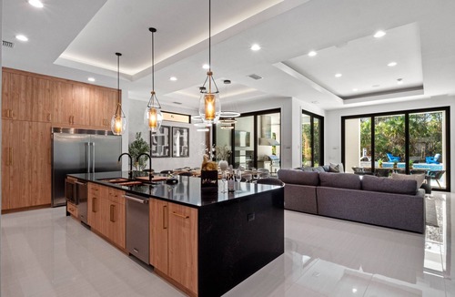 Reunion Villa | Luxe Retreat | 9BR Luxe Villa w/Saltwater Pool, Gym, Theater, and Arcade Near Orlando Theme Parks