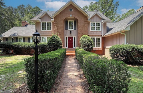 Thomasville House | Luxurious 4-Bedroom Retreat with Theater, Pool, Hot Tub, and Bar on 6 acres.
