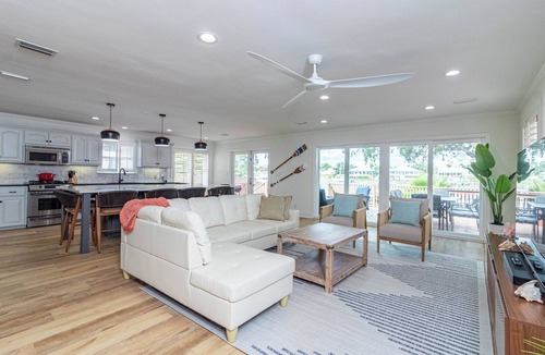 Ono Island House | Luxurious 4-BR Beachfront Escape: Private Beach, Fishing Dock, Boat & Family Fun