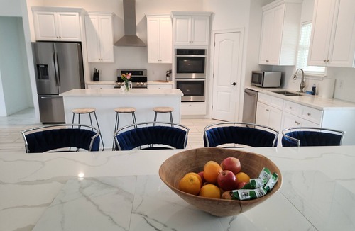 Gulfport House | Luxurious 7-bedroom Estate with Movie Theatre, Pool, and Basketball Court