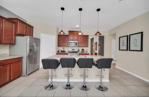 Loughman House | Luxury 6BR Pool Home in Solterra Resort