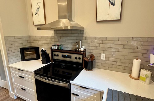 Crescent City House | Luxury Canal-Front 4BR Home, Large Patio, Dock, Springs Access, Boater Friendly