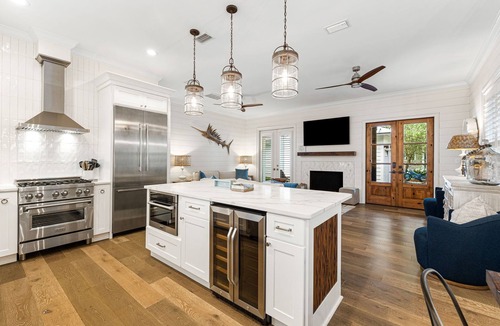 White's Gulfview House | Luxury retreat with screened pool, outdoor kitchen & dining, and coastal charm