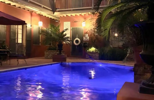 French Quarter Apartment | Maison Rouge in French Quarter. Includes 2 Endymion Ball Tickets