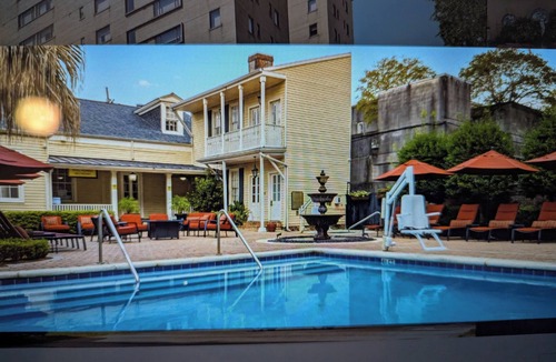 Faubourg Livaudais Resort | Mardi Gras in New Orleans, on Charles St. in the French Quarter