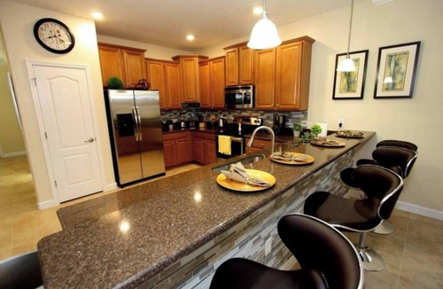Davenport Villa | Massive 3,800+ sq ft 9B/5B luxury villa at Champions Gate. Private pool, game room, sleeps 29.
