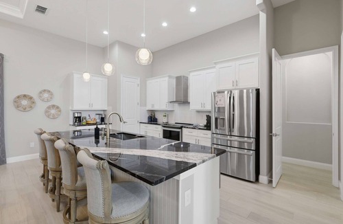 Palm Coast House | Modern 3BR Retreat opt Heated Pool & Large Game Room