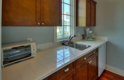 West Panama City Beach Apartment | Moreland Carriage House - Close to Beach & Playground! Free Bikes/Fitness/Tennis