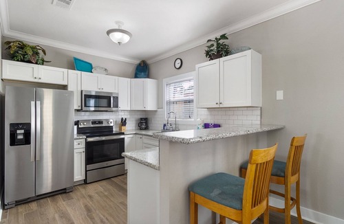 Ono Island Condo | NEW Listing! Don't miss out on this PEACH at Popular Purple Parrot Resort!
