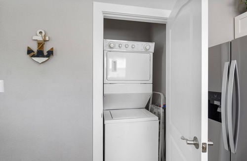 Ono Island Condo | NEW Listing! Don't miss out on this PEACH at Popular Purple Parrot Resort!