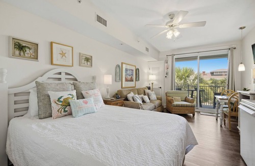 Baytowne Wharf Condo | New! Studio with Covered Balcony, Tropical Pool Views, Hot Tub, Tram