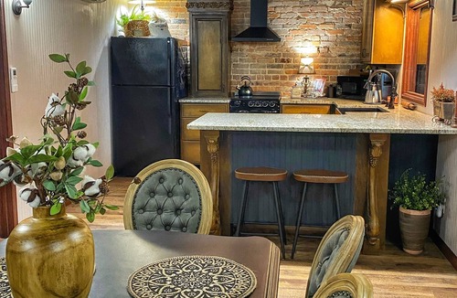 Ashland Apartment | Night Deposit- 2 bedroom apartment in historic bank on the town square- sleeps 6
