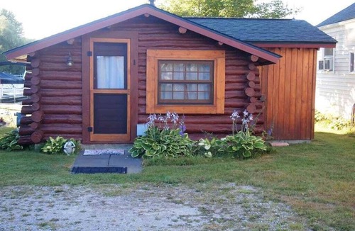 Ponshewaing Cabin | Northern Michigan Getaway - Cozy Log Cabin right on Crooked Lake Waterfront