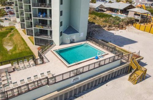 New Smyrna Beach Apartment | Ocean View with a beachfront pool at Ocean Trillium Condo ~ 102
