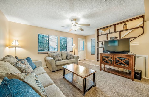 Sugar Beach House | Oceanfront townhouse near beach with pool, balcony, central AC, & washer/dryer