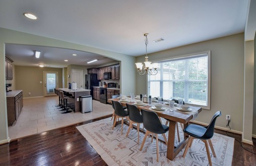 Northport House | Overtime Outpost-Book for football season and more! Fenced in back-yard!