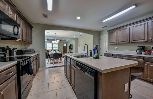 Northport House | Overtime Outpost-Book for football season and more! Fenced in back-yard!