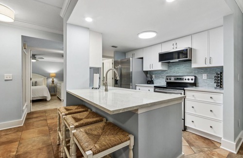 Amelia City House | Pet Friendly | Ground Level Sailmaker Villa | Private Covered Patio | Close to Pool