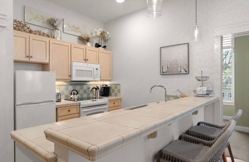 Baytowne Wharf Condo | Poolside Condo w/GOLF CART! Tram to Beach. Steps to Pool and Baytowne Wharf!