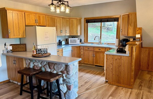 Rapid City Cabin | Private Cabin with Lake Views Near Torch Lake, Fire Pit & Boat Parking