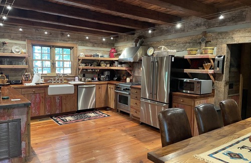 Empire Cabin | Prospect Mountain Cabin custom log home sportsman's paradise with fishing lake.
