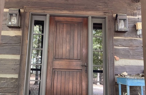 Empire Cabin | Prospect Mountain Cabin custom log home sportsman's paradise with fishing lake.