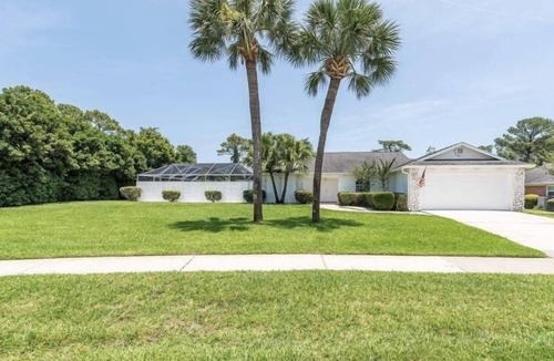 Saint Augustine Shores House | Relax by the salt water pool, and enjoy the gorgeous Marsh, and wildlife views.