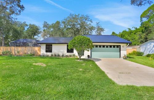 St. Augustine South House | Renovated home with private pool, patio, outdoor fireplace, & grill