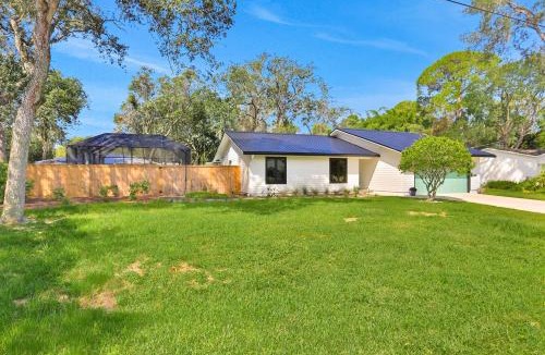 St. Augustine South House | Renovated home with private pool, patio, outdoor fireplace, & grill