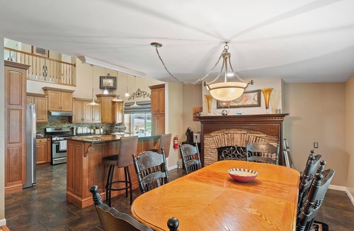 Double Springs House | Rocking W - screened in porch and lakeside fire pit!