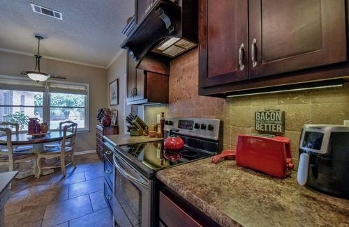 Northport House | Running Back Roost - Swimming Pool, Fenced in, & More!