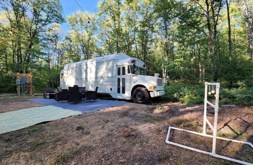 Bitely House | Rustic Converted School Bus with Outdoor Shower Near ORV Trails in Manistee National Forest, Michigan