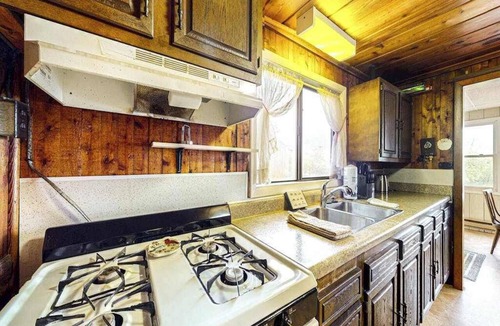 East Jordan House | Rustic Cottage w/dock access, kayaks, and year-round adventures in East Jordan