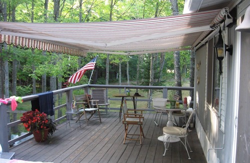 Mesick Cabin | Rustic Treehouse on fabulous private boating, fishing and swimming lake
