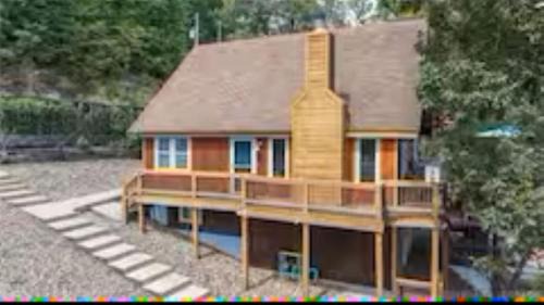Stover House | Sandy beach water toys great dock