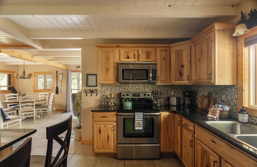 Gaylord Cottage | Scenic Lakefront Near Town w/Hot Tub and Lake Toys