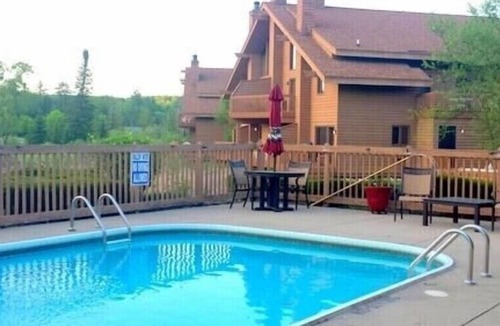 Mancelona Condo | Schuss Mountain condo, newly renovated, on golf hole #1!