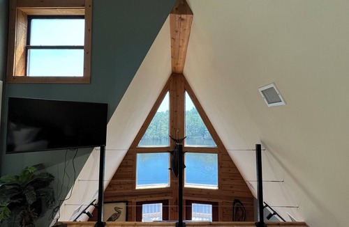 Satsuma Cabin | Secluded cabin on the water with jetski, hottub & kayak! Pets OK & early checkin
