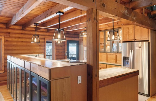 Charlevoix Ski Chalet | Secluded, log cabin chalet 16+ custom outdoor fire pit, air hockey, 2 hot tubs!