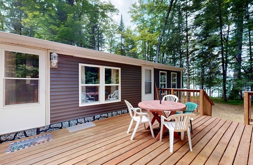 Eagle River House | Serene Lakefront Home w/dock, gas grill, fire pit, WIFI, on ATV trail